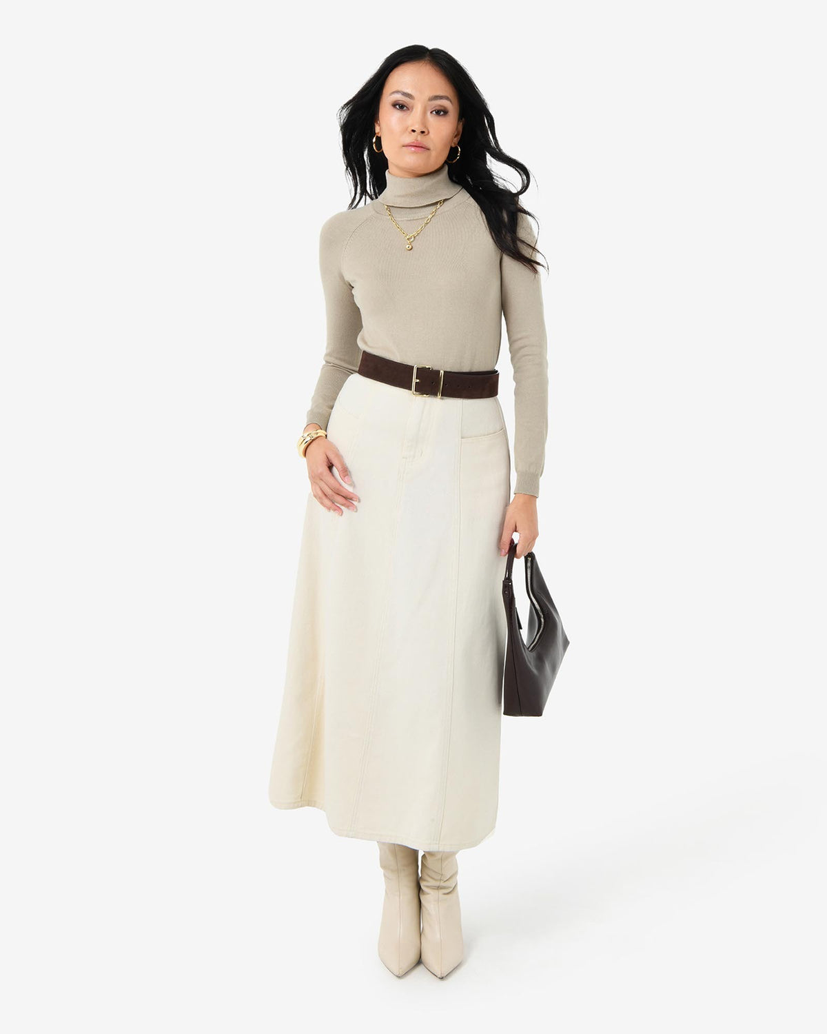 Clarisse Turtleneck Sweater in pastel khaki — full-length view