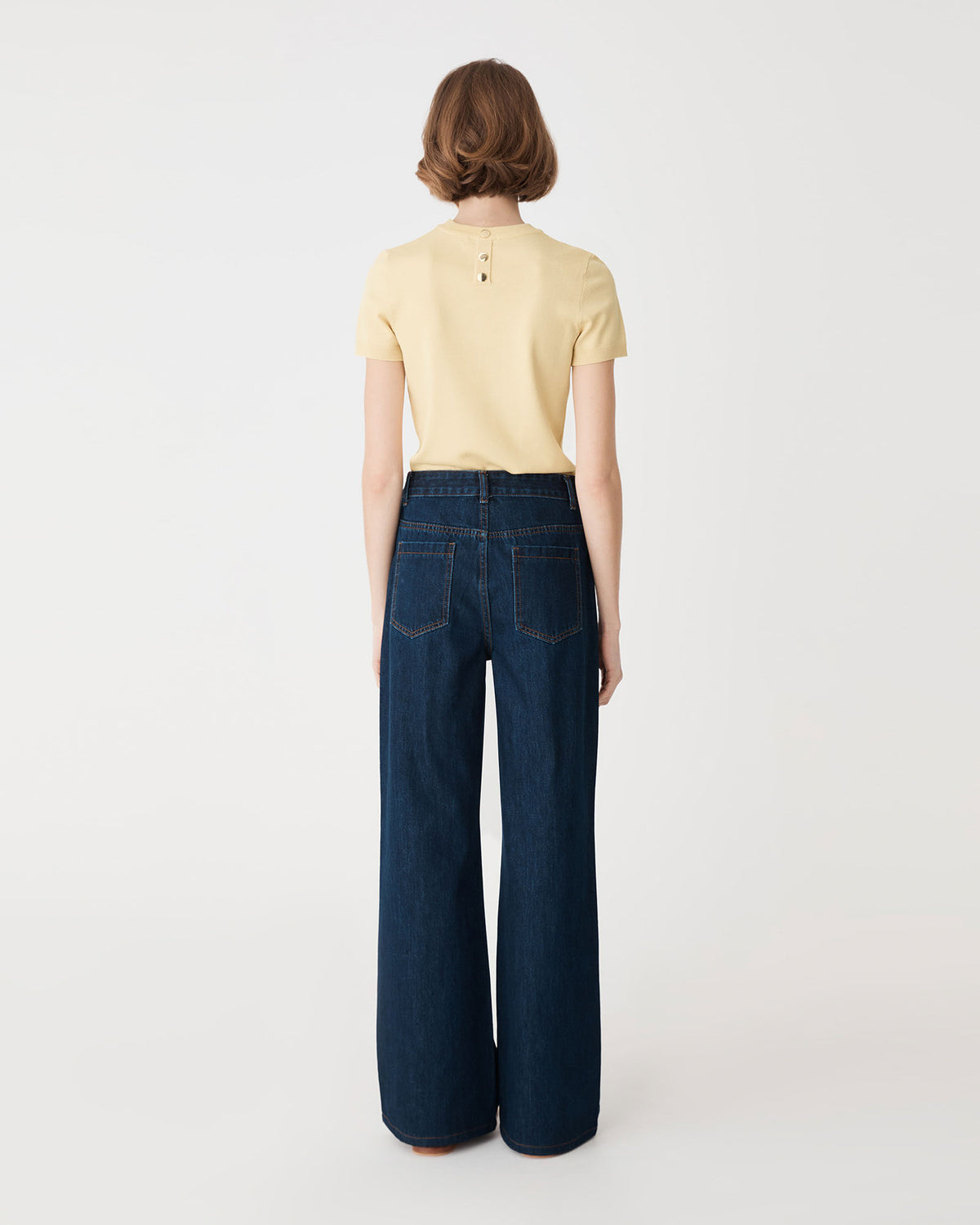 Catherine Short Sleeve Knit in straw yellow — back view