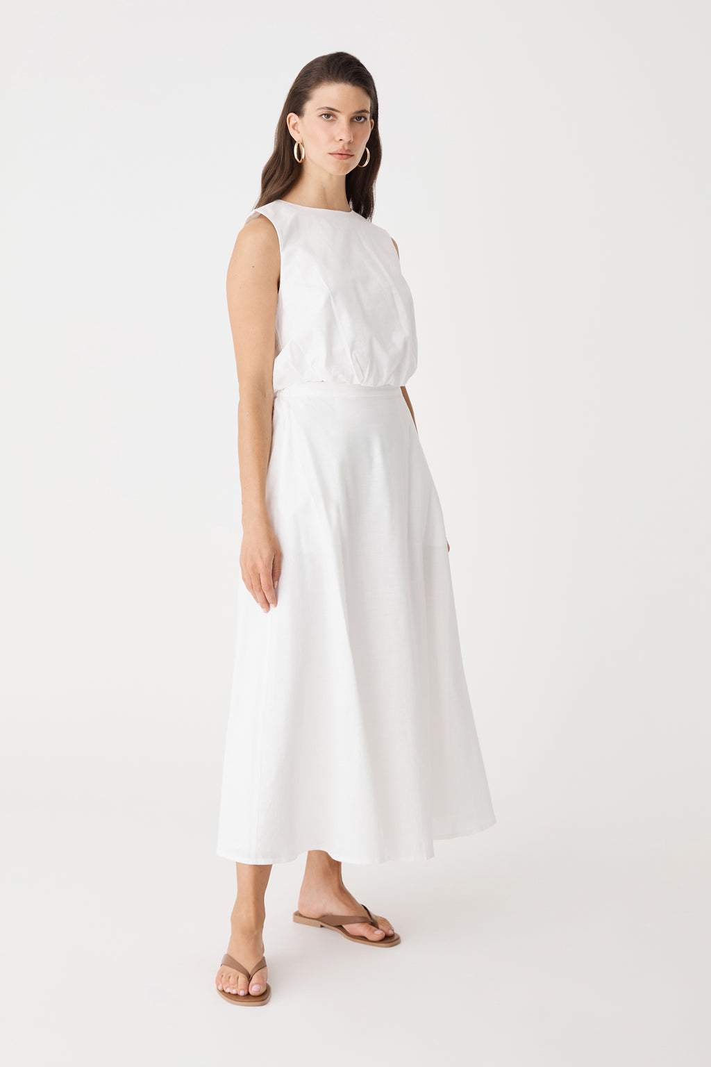 Side view of the ivory Kenya Linen Skirt showing the A-line shape