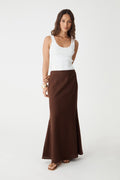 Amelia Linen Blend Maxi Skirt in chocolate, front view worn with a white tank top