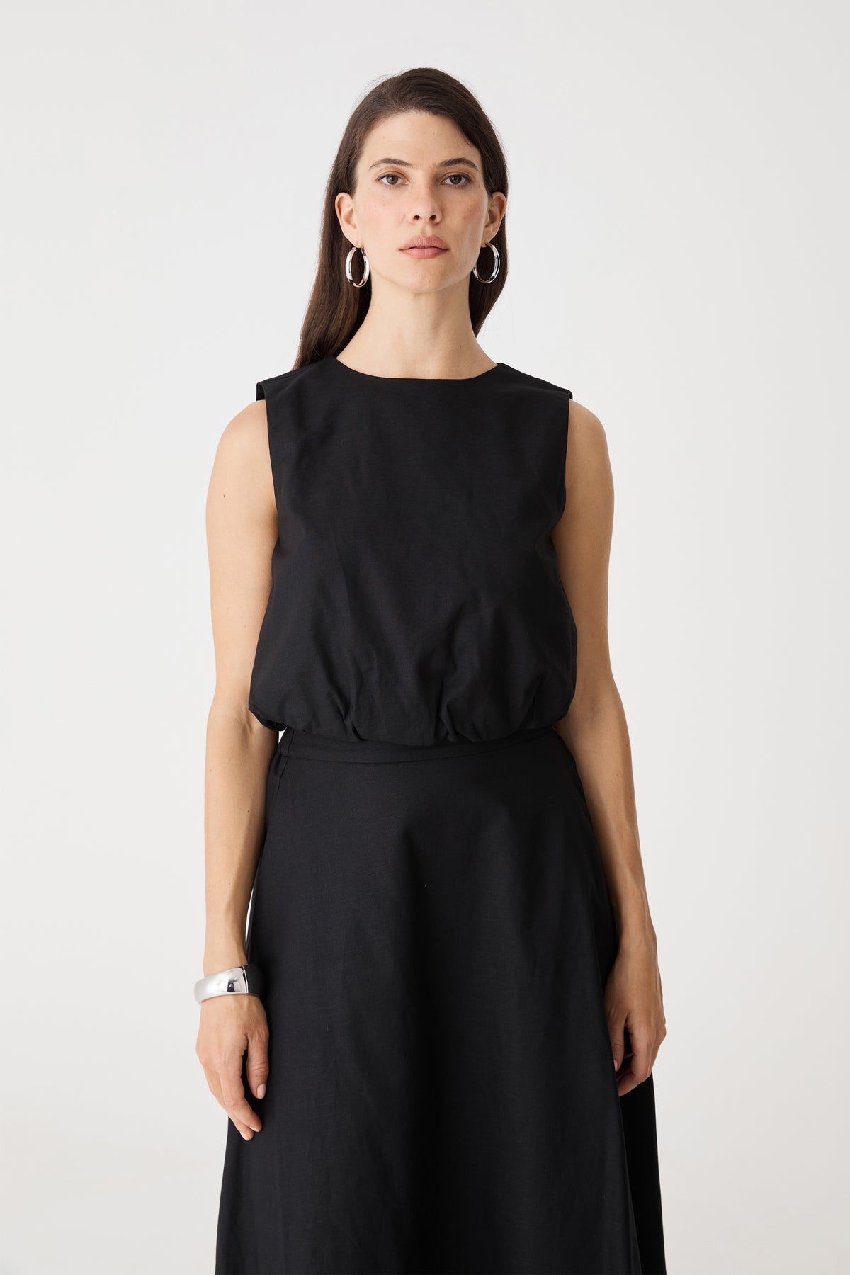 Close-up front view of the black Kenya 2 Ruched Linen Top, showing round neckline and sleeveless cut