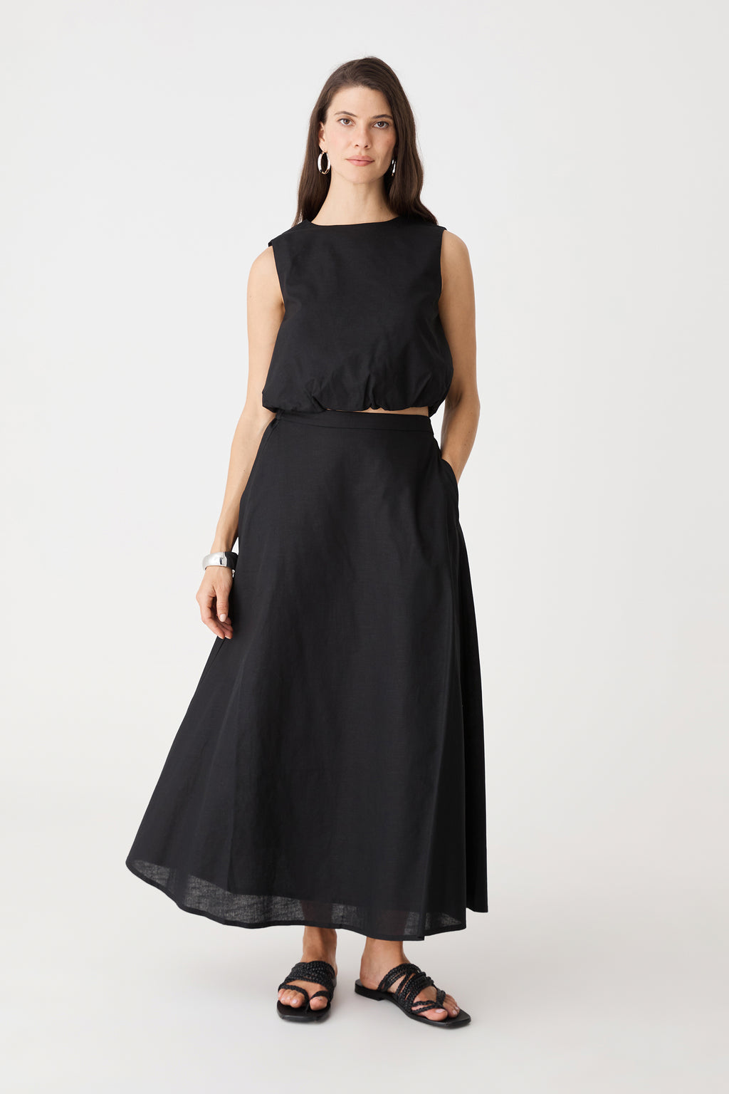 Kenya 2 Ruched Linen Top in black, front view, worn with matching black Kenya Linen Skirt