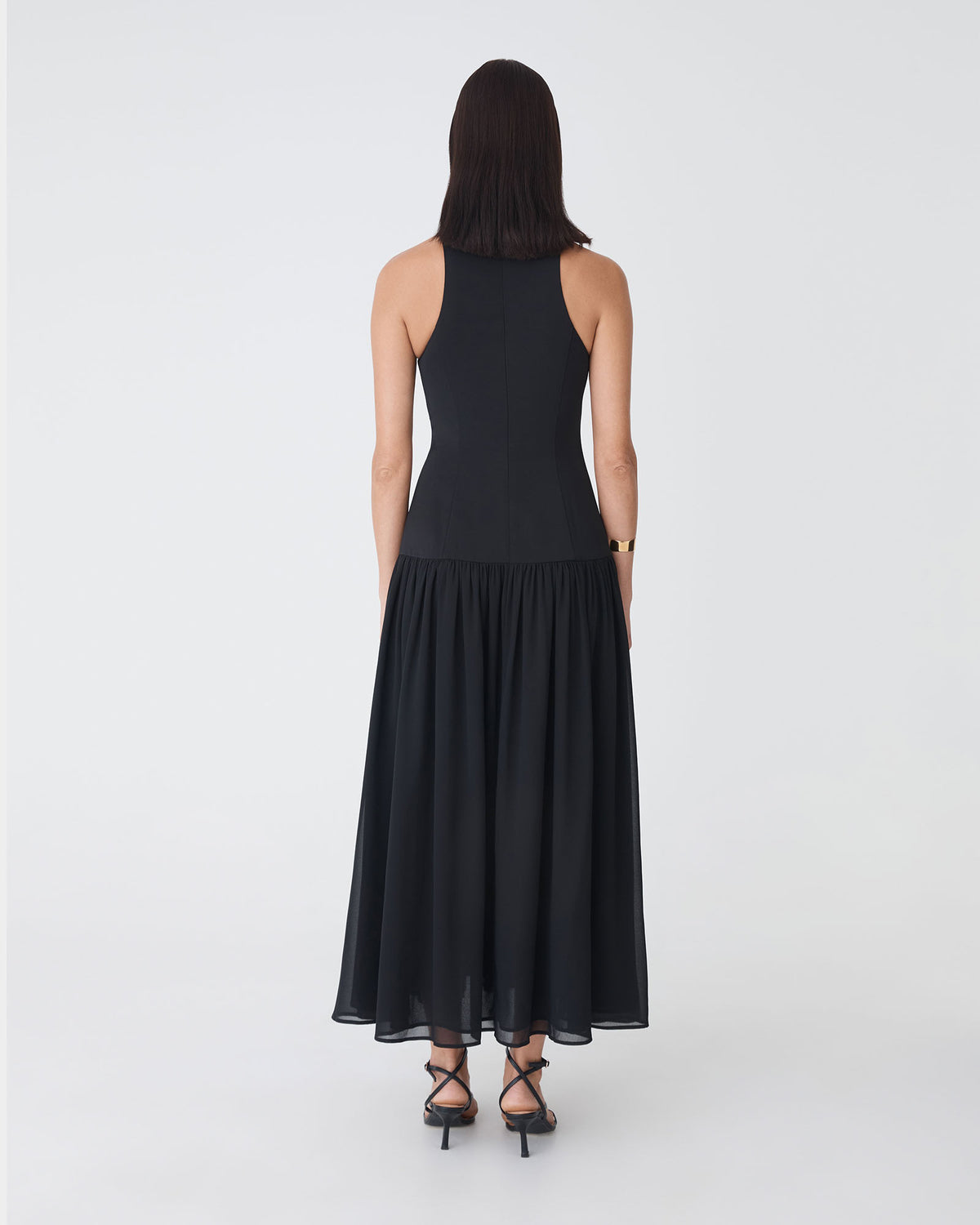 Selena Dropped Waist Dress in black — back view