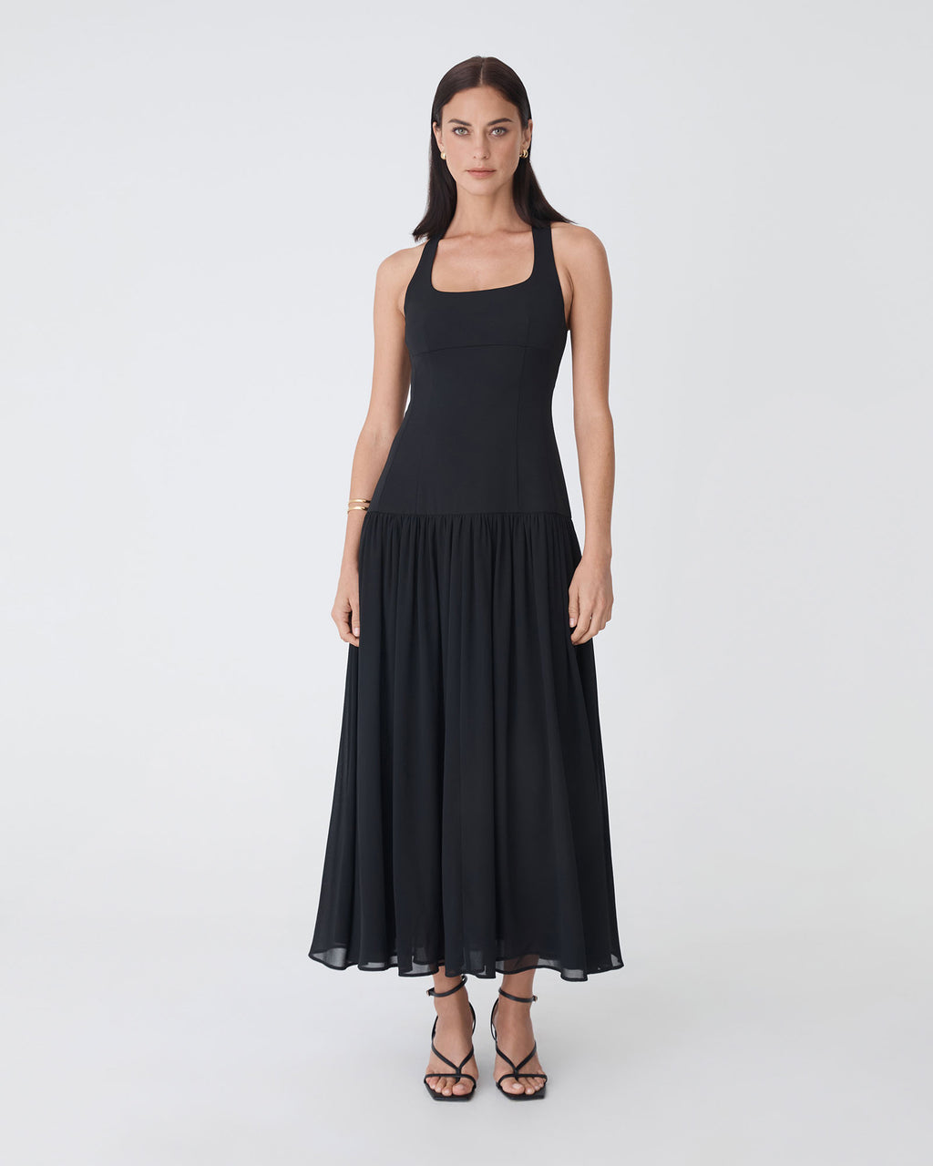 Selena Dropped Waist Dress in black — full-length view