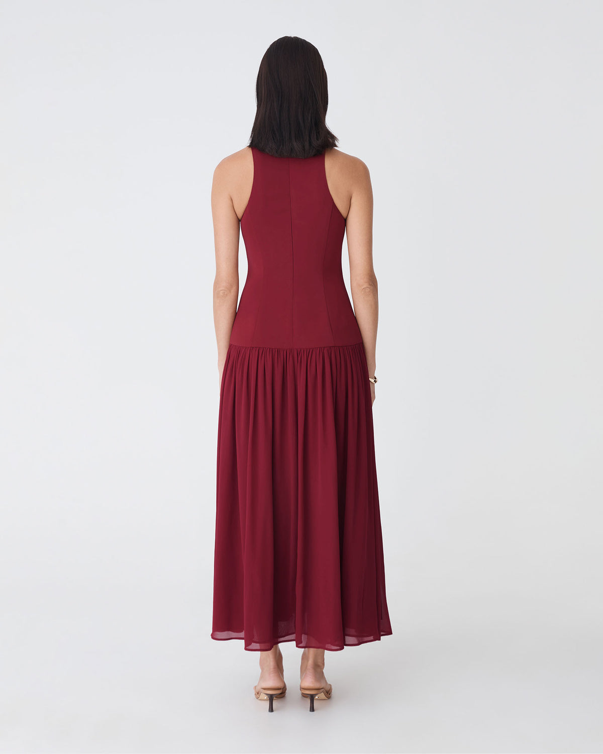 Selena Dropped Waist Dress in deep red — back view