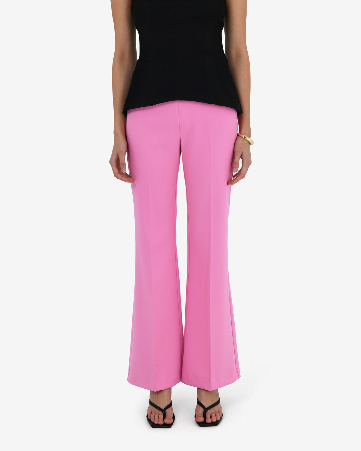 Belmore Crepe Flared Pants in bubblegum — close-up view