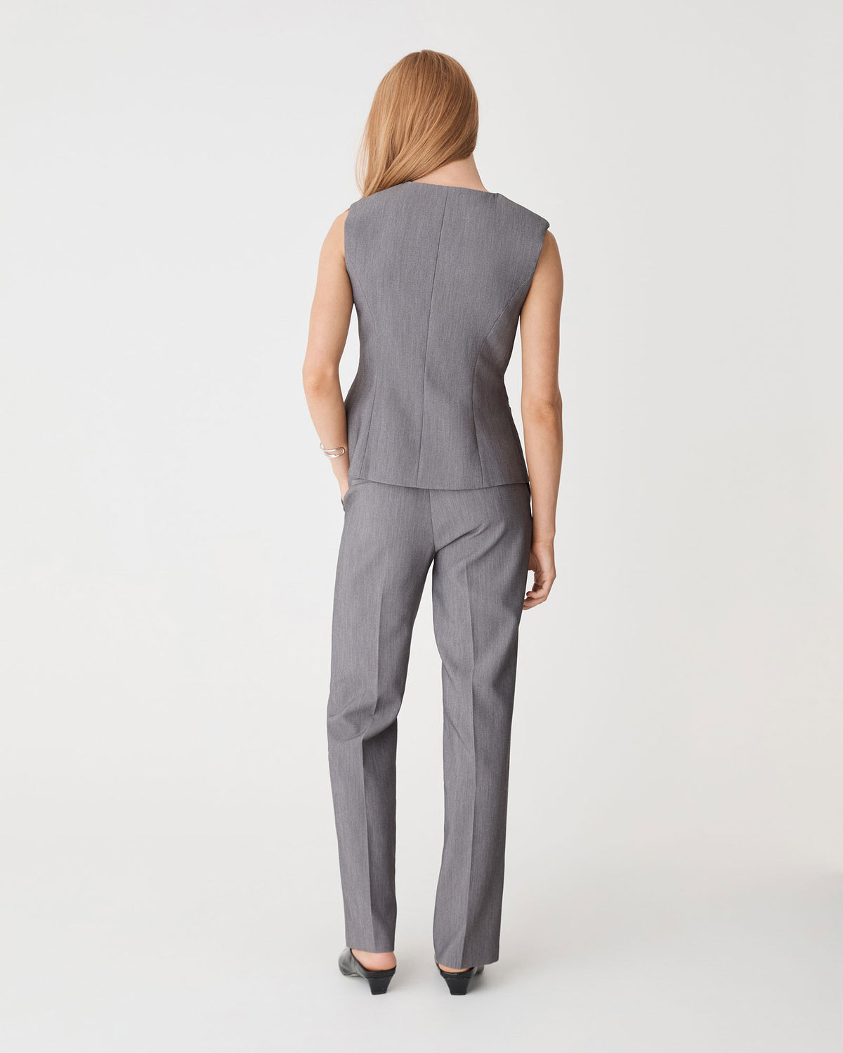 Nikki Collarless Vest in melange grey — back view