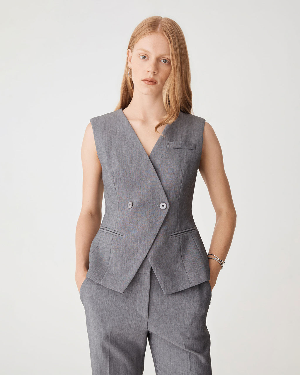 Nikki Collarless Vest in melange grey — close-up view