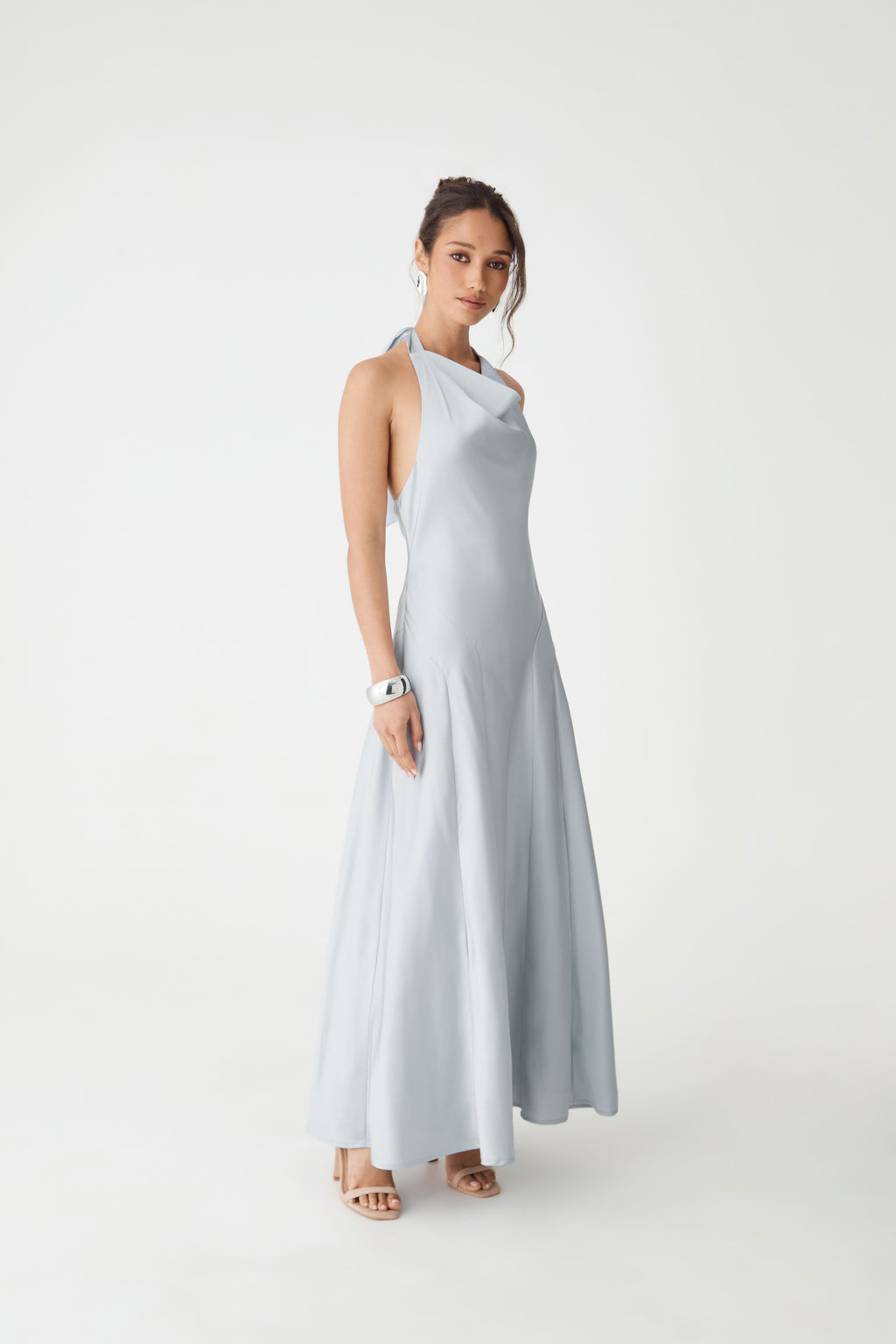 Angled front view of the Powder Blue satin maxi dress with flared skirt