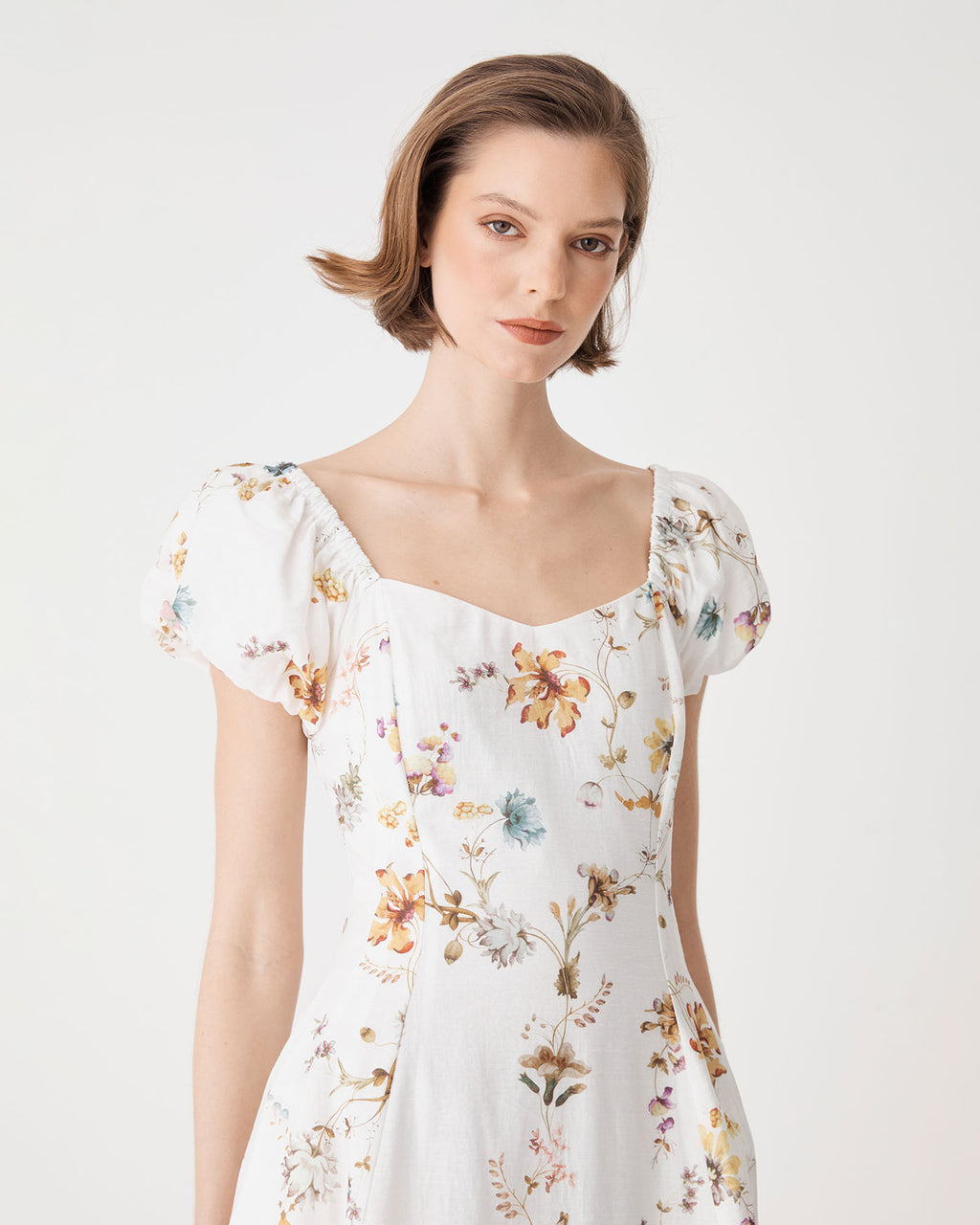 Katie Puff Sleeve A-Line Dress in ivory floral — fabric detail 2