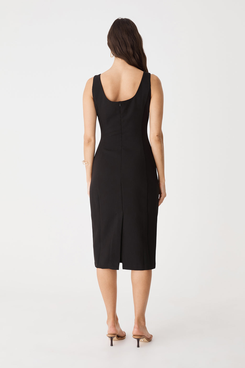 Back view showing scoop back and centre-back hem vent of the black Melanie2 dress