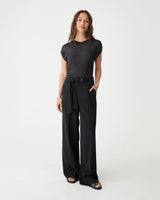 Saskia Lurex Knit Top in black, front view worn with black wide-leg trousers