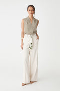 Natalie Belted Wide Leg Pants in cream, front view with olive botanical scarf belt and olive sleeveless top