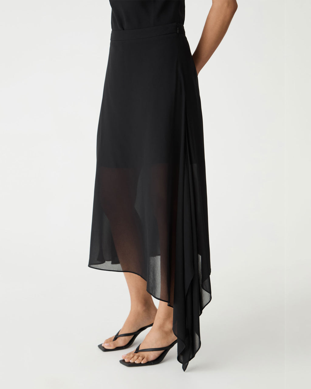 Side view close-up of the waterfall side drape and draped hem
