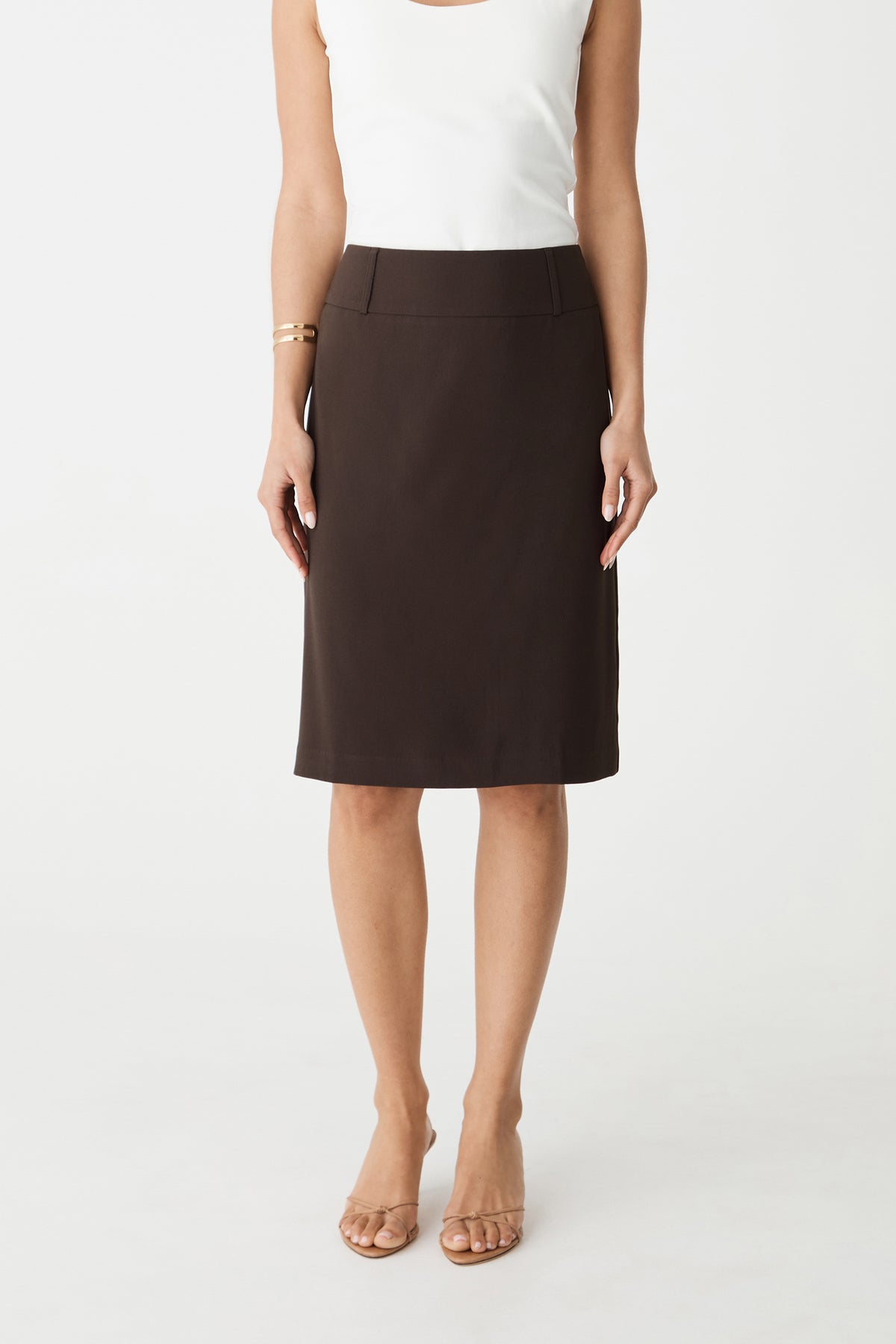 Front view of the chocolate Veronica Straight Crepe Skirt, midi length with white top