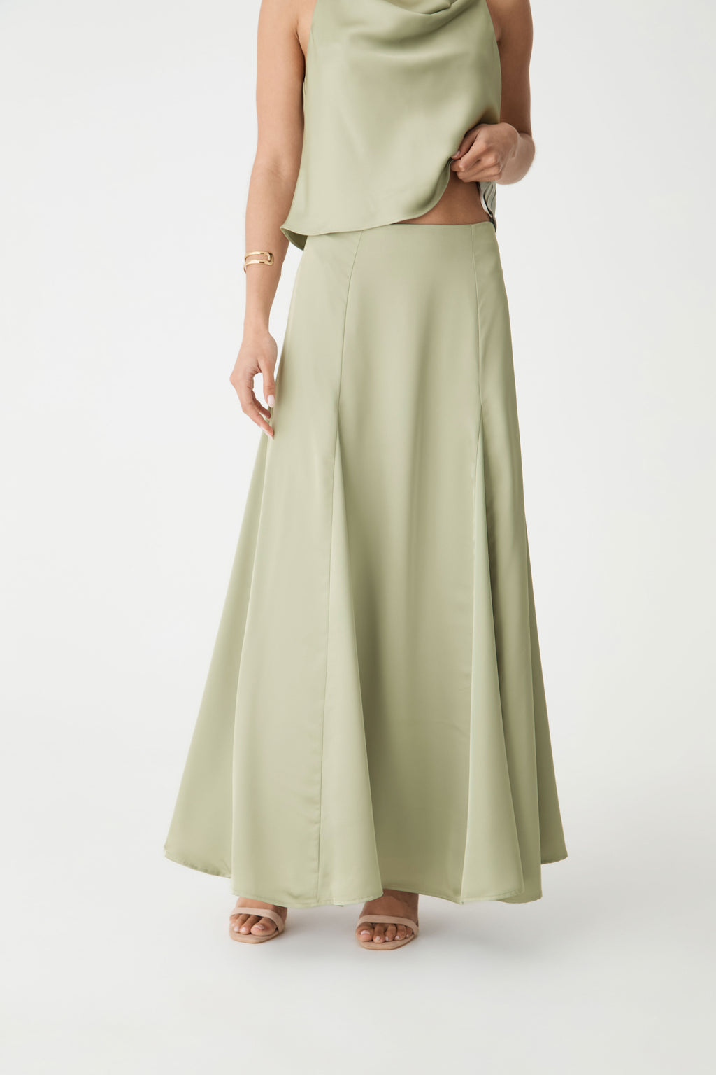 Freya Satin Godet Skirt in pistachio — close-up view