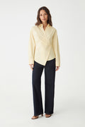 Katrina Wrap Shirt in Limoncello, full-length front view worn with navy wide-leg trousers