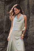 Freya Satin Cowl Top in pistachio, side view showing draped cowl neckline and relaxed armhole, worn with matching skirt