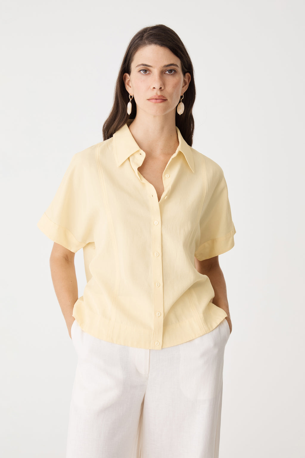 Heather Lyocell Shirt in Limoncello, front view with pointed collar, worn with white wide-leg trousers