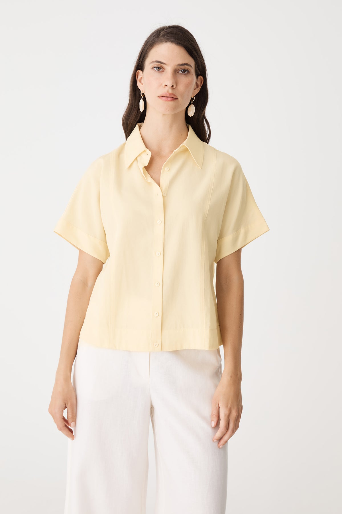 Front view of the Limoncello shirt with button closure and straight hem band