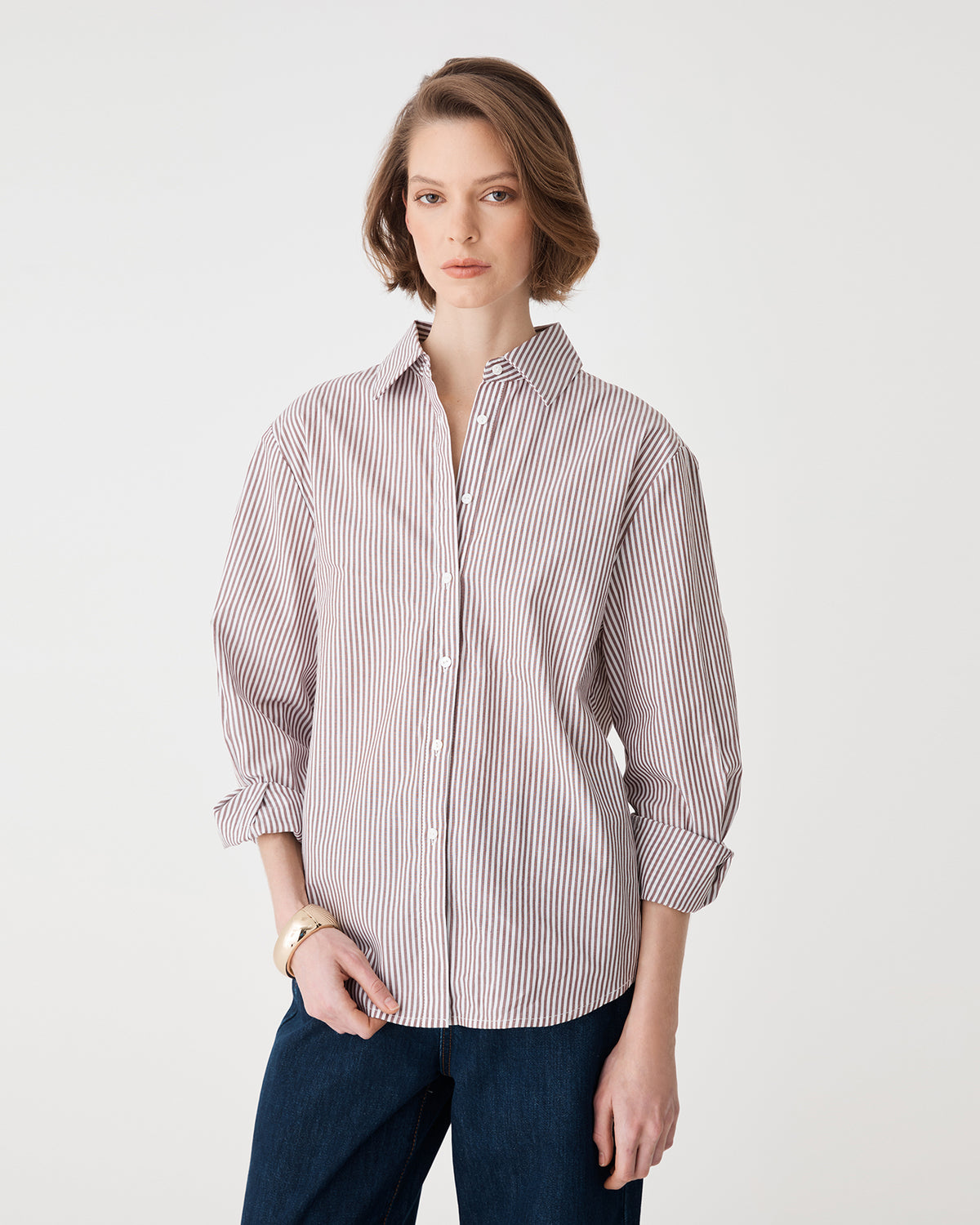 Close-up of pointed collar and front button placket