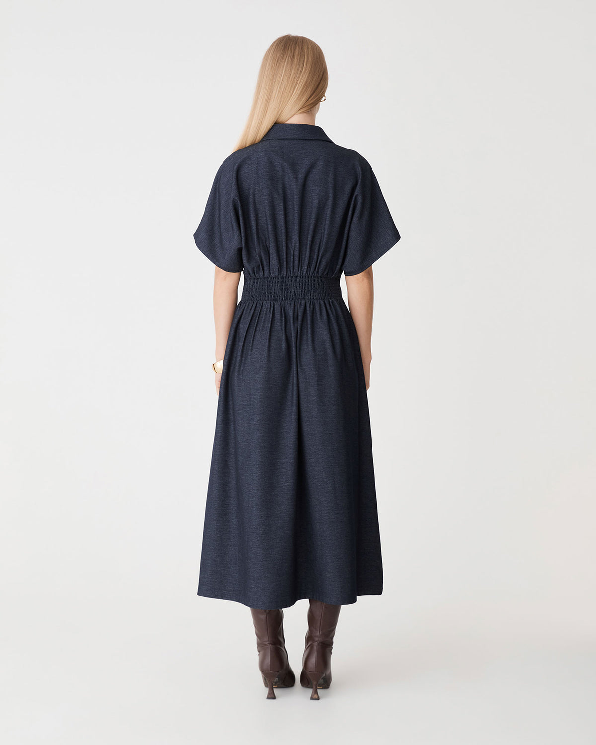 Gilda Pleat Waist Dress in indigo — back view