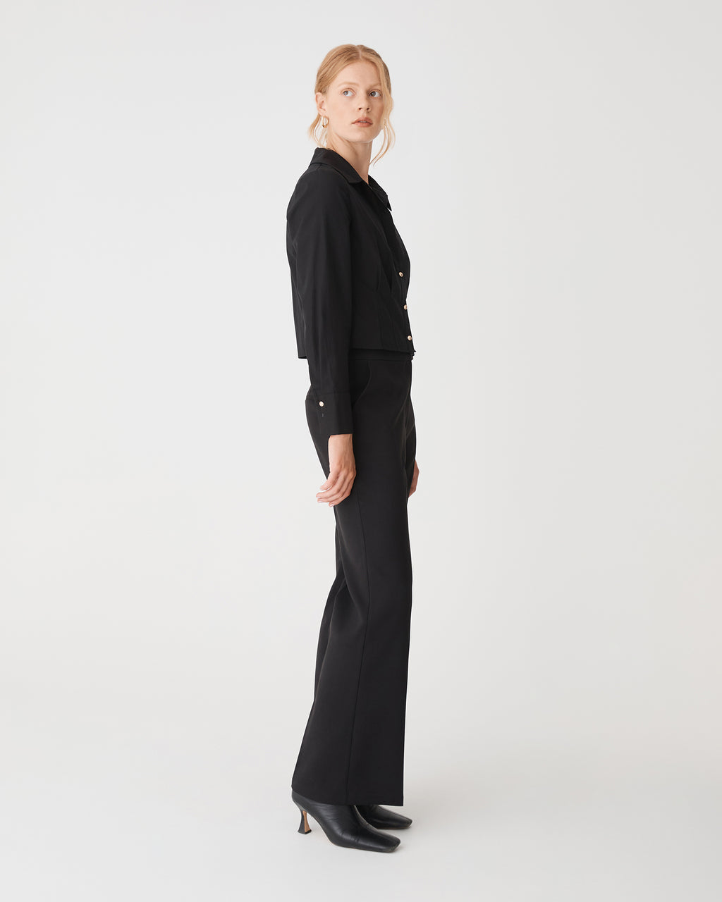Gabby Pleated Hem Shirt in black — side view