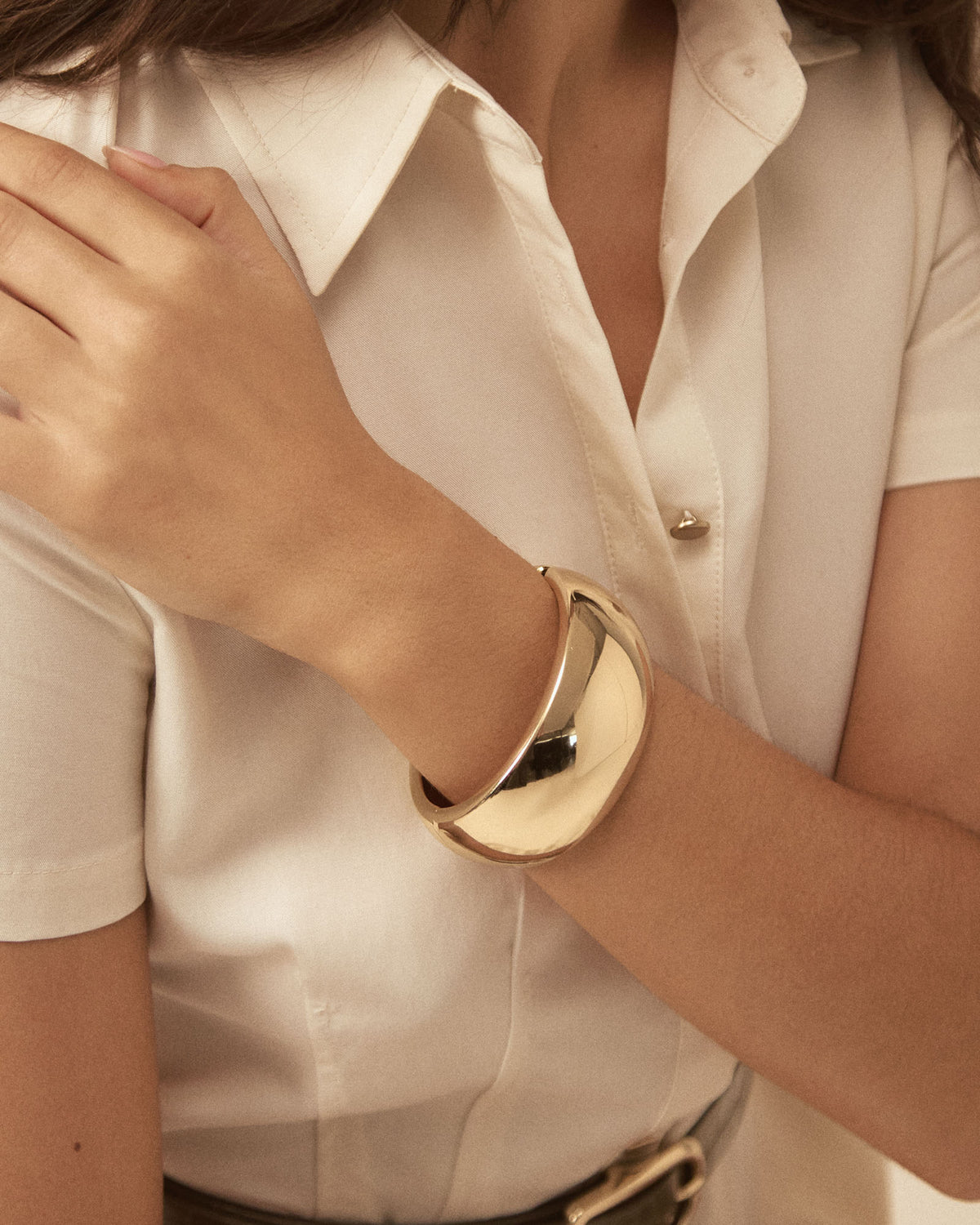 Valeria Statement Bangle in gold — close-up view