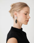 Nora Statement Earrings in gold — fabric detail